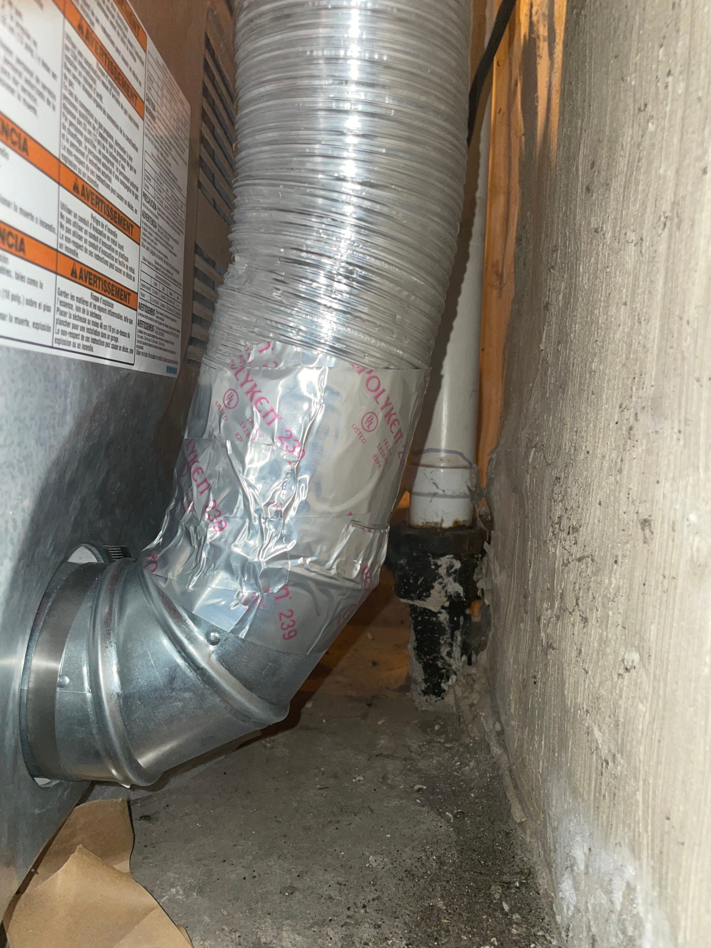 After — 26-gauge galvanized steel elbow & UL 2158A-listed transition duct — fully code-compliant